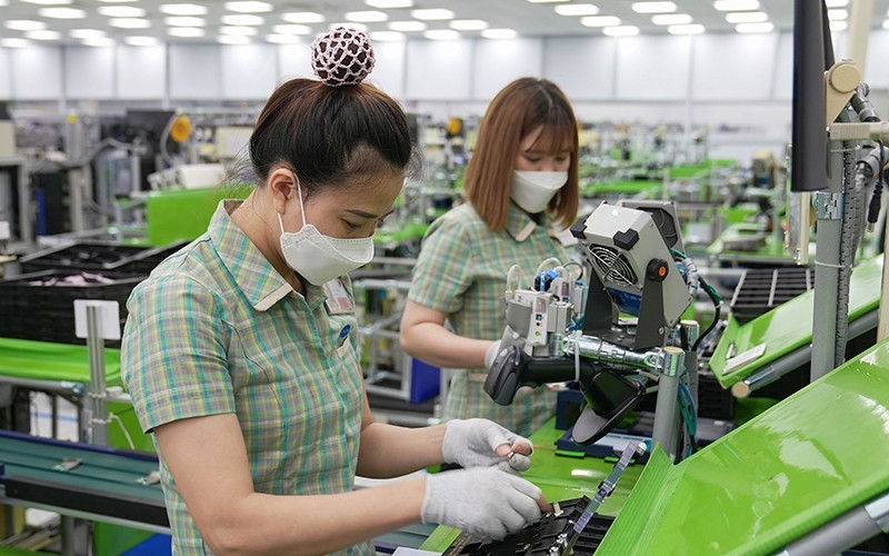Staff assemble products at a SamSung factory in Bac Ninh province. 
