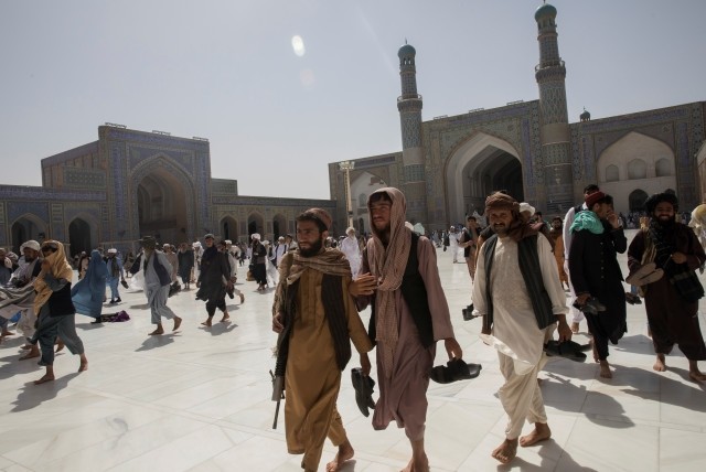 Afghan men walk at a mosque in Herat, Afghanistan September 10, 2021. (Photo credit: Via Reuters)