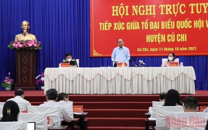 President Nguyen Xuan Phuc speaking at a meeting with voters in Cu Chi district, Ho Chi Minh City. (Photo: NDO/Quy Hien)