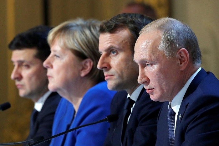 Ukraine's President Volodymyr Zelenskiy, German Chancellor Angela Merkel, French President Emmanuel Macron and Russia's President Vladimir Putin attend a joint news conference after a Normandy-format summit in Paris, France December 9, 2019. (Photo: Reuters) 