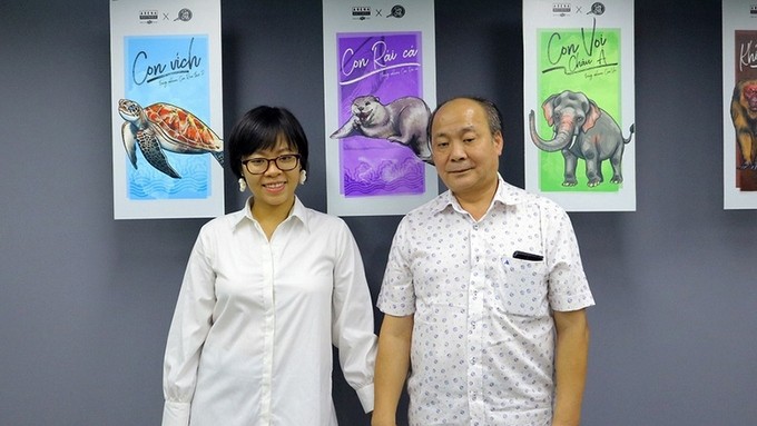 Do My Linh and her father at her first painting exhibition entitled "Hau's Story" in 2019. (Photo: My Linh)