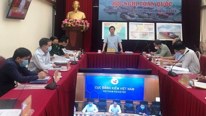 Minister of Transport Nguyen Van The speaking at the teleconference. (Photo: qdnd.vn)