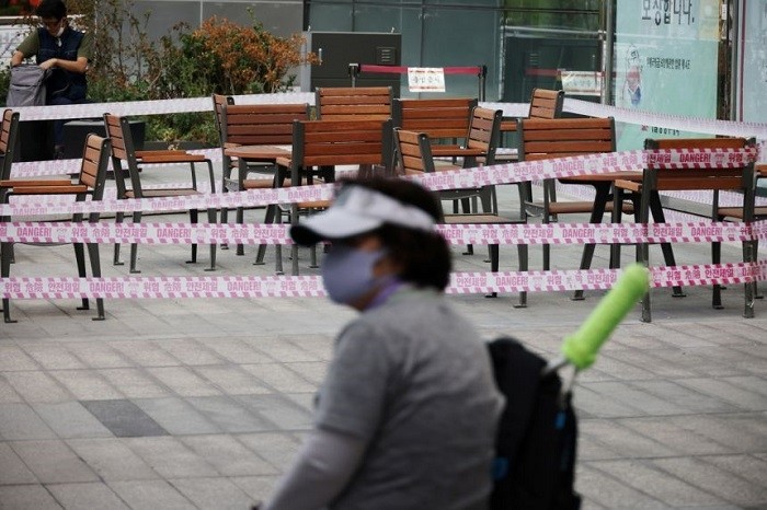 Republic of Korea said on Friday it would lift stringent anti-coronavirus curbs on social gatherings next week, as the country prepares to switch to a 'living with COVID-19' strategy amid rising vaccination levels.
