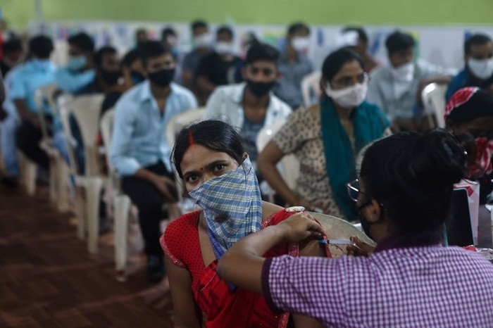 The government wants all of India's 944 million adults to get vaccinated this year. 