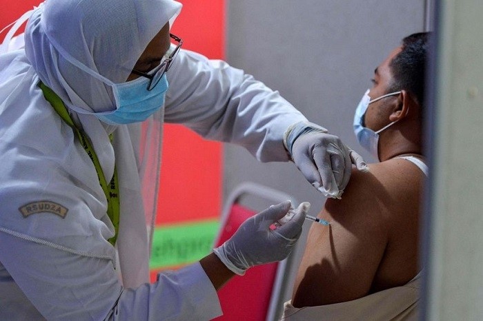 Indonesian President Joko Widodo says that the Southeast Asia country will gradually reopen parts of the country where COVID-19 vaccination rates are above 70%.