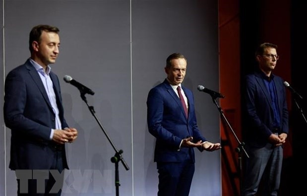 From the left: CDU General Secretary Paul Ziemiak, FDP General Secretary Volker Wissing, and CSU General Secretary Markus Blume, give a press statement after the exploratory talks. (Photo: AFP/VNA)