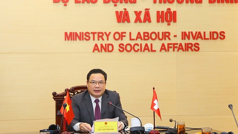 Deputy Minister of Labour, Invalids and Social Affairs Le Van Thanh attends an online dialogue (Photo: Molisa).