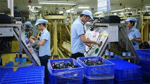 Economists forecast Vietnam should still attract some US$30 billion in foreign direct investment this year. (Photo: VNA)