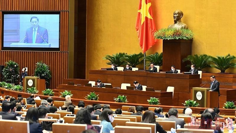 Prime Minister Pham Minh Chinh answers questions of National Assembly deputies. (Photo: Linh Nguyen)