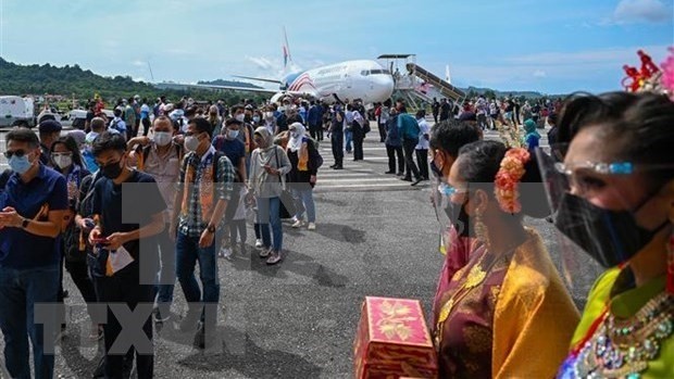 Tourists arrive at Langkawi Island, Malaysia on September 16, 2021. (Photo: AFP/VNA)