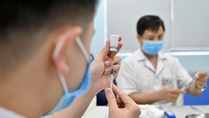 The Ministry of Health once again asks cities and provinces nationwide to speed up COVID-19 vaccination. (Photo via NDO)
