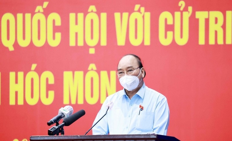President Nguyen Xuan Phuc speaking at the meeting with voters in Cu Chi and Hoc Mon districts. (Photo: VGP)