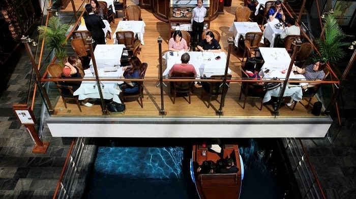 Limits on social interaction and dining out are set to ease in Singapore. (Photo: Reuters)