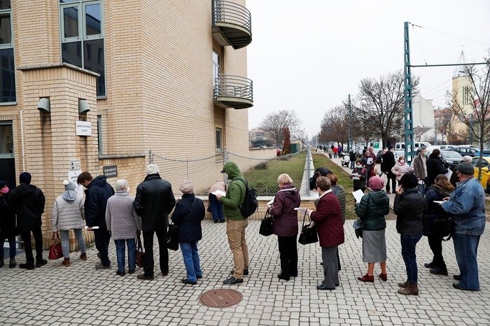 People were lining up for COVID-19 shots outside Budapest's main hospitals on Monday as Hungary for the first time offered vaccinations without prior registration amid a surge in new infections.
