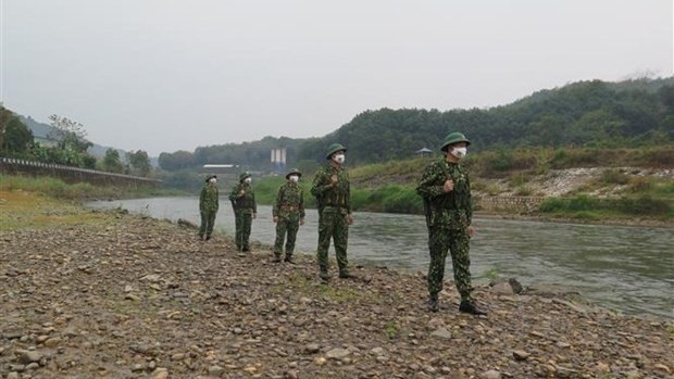Border guards in Lao Cai in a patrol (Photo: VNA)