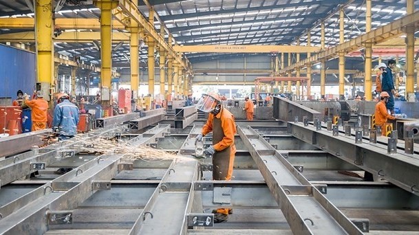 Employees work at Dai Dung Metallic Manufacture Construction and Trade JSC at An Ha Industrial Park in Ho Chi Minh City’s Binh Chanh district. (Photo: VNA)