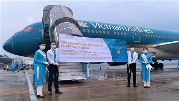 A Vietnam Airlines flight with 170 passengers on board departing from San Francisco, the US, arrives at Da Nang International Airport on December 1. (Photo: VNA)