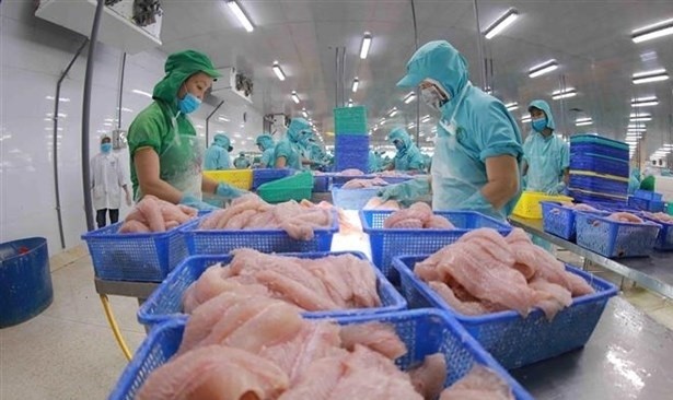 Vietnam recorded 299.67 billion USD in exports and 299.45 billion USD in imports in the first 11 months of this year. (Photo: VNA)