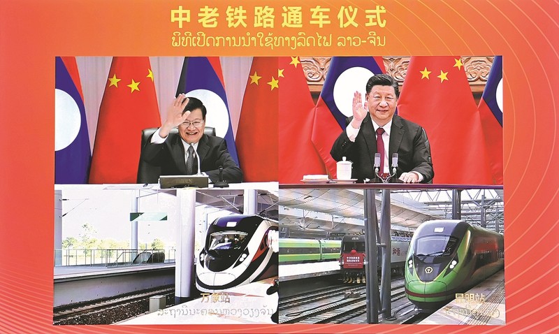 President Xi Jinping and his Lao counterpart Thongloun Sisoulith jointly inaugurate the China-Laos Railway via video link on Friday. (Photo/Xinhua)