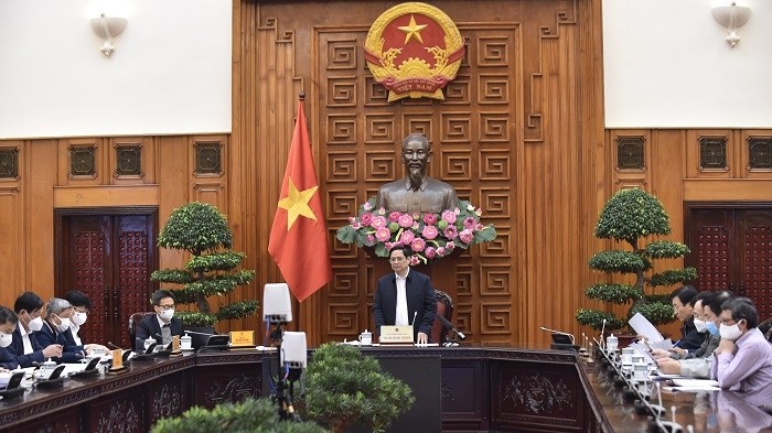 Prime Minister Pham Minh Chinh chairs the meeting in Hanoi on December 5 (Photo: NDO/Tran Hai)