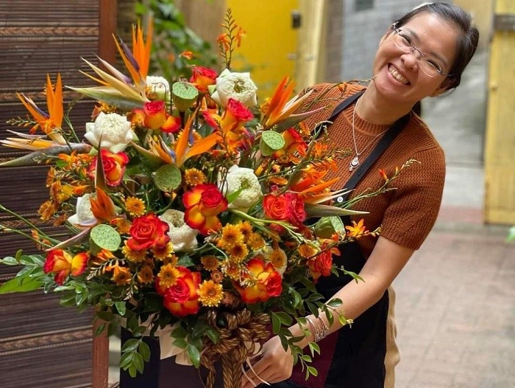 Bui Bang Giang and basket flower arrangement made by Comida Ngon (Photo credit: Bui Bang Giang)