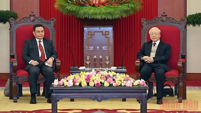 Party General Secretary Nguyen Phu Trong (R) and Chairman of the Lao National Assembly Xaysomphone Phomvihane. (Photo: NDO)