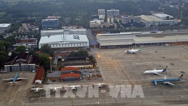 At Noi Bai international airport (Photo: VNA)