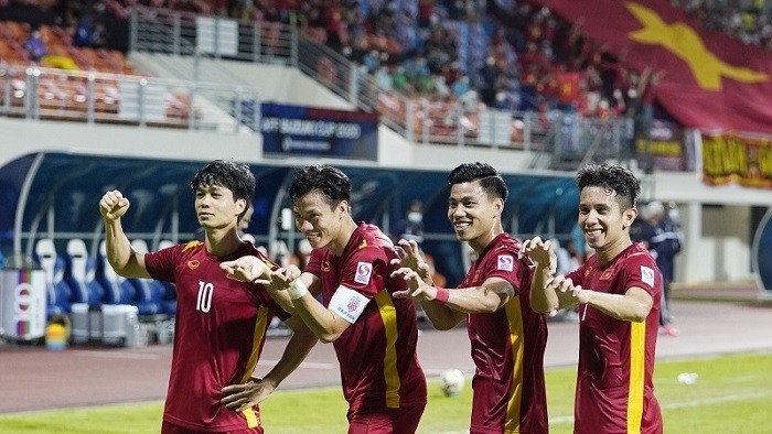 Vietnamese players celebrate after scoring a goal against Malaysia. (Photo: VFF)