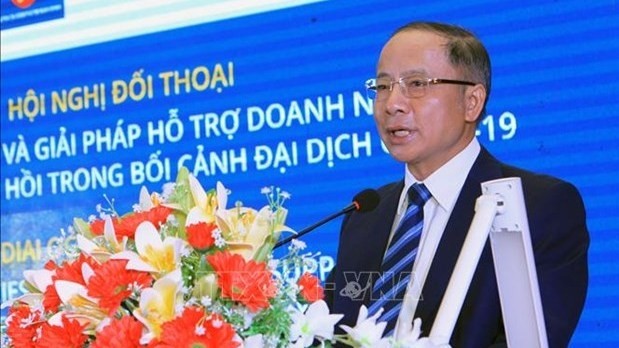 Vice Chairman of the Advisory Council for Administrative Procedure Reform Nguyen Van Than speaks at the event (Photo: VNA)
