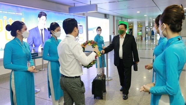 Vietnam Airlines on January 1 coordinated with authorities of Ho Chi Minh City, Da Nang city and Thua Thien - Hue province to hold ceremonies to welcome the first tourists to the localities in 2022. (Photo: VNA)