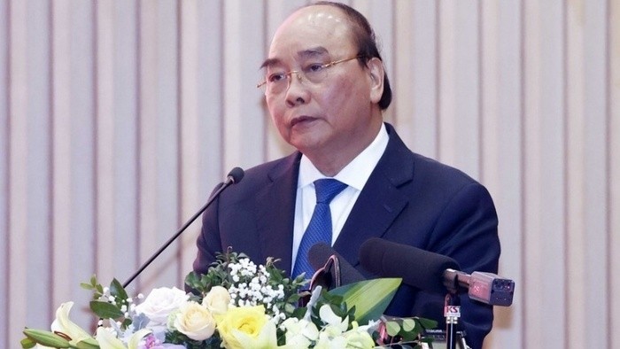 President Nguyen Xuan Phuc speaks at the conference. (Photo: VNA)