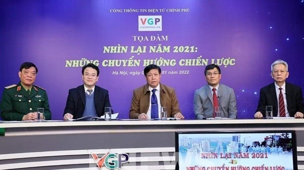 The seminar is held by the Vietnam Government Portal (VGP) in Hanoi on January 4 to discuss COVID-19 response policies adopted by the Government last year. (Photo: MPI)