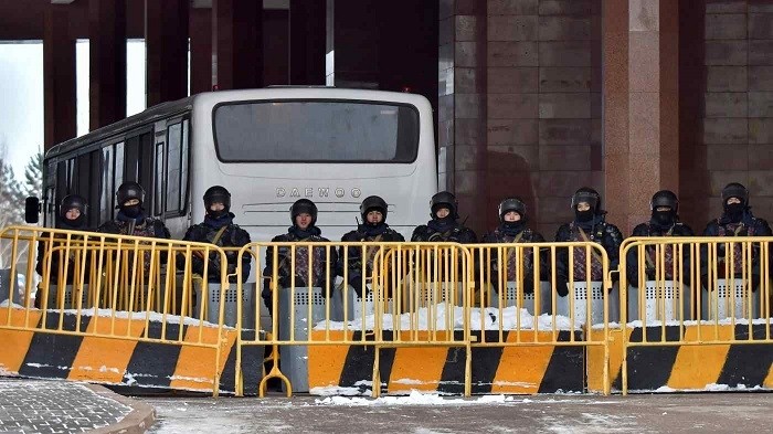 Kazakh law enforcement officers block a street leading to the official presidential residence in Nur-Sultan on Jan. 6 after protests against the government. (Photo: Reuters)