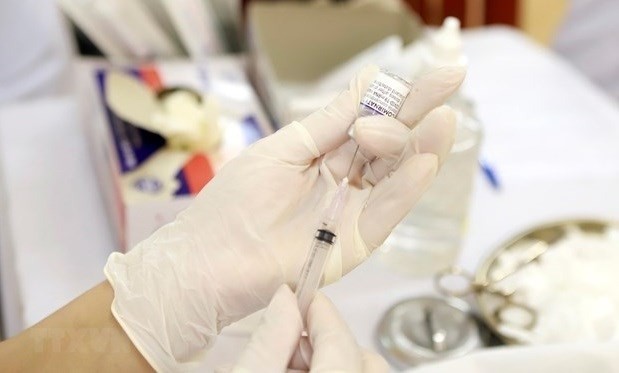 Health Ministry requested to conduct a survey on COVID-19 vaccinations for children aged from five (Photo: VNA)