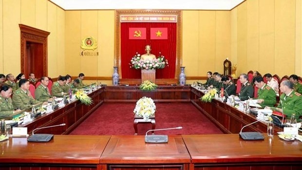 An overview of talks between Vietnamese Minister of Public Security Gen. To Lam and his Lao counterpart Gen. Vilay Lakhamphong (Photo: VNA)