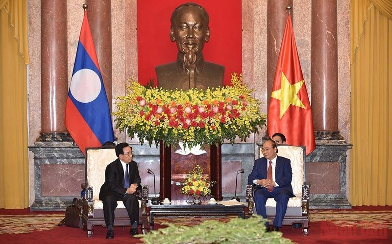 President Nguyen Xuan Phuc and Lao Prime Minister Phankham Viphavanh (Photo: TRAN HAI)