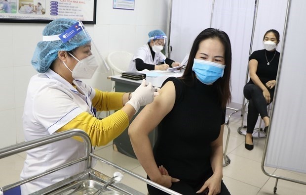 A woman vaccinated against COVID-19 (Photo: VNA)