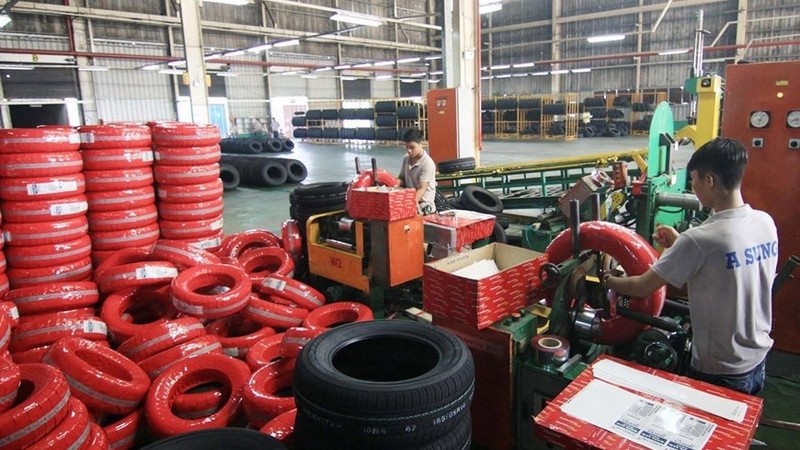 Manufacturing car tyres in Binh Duong Province (Photo: VNA)