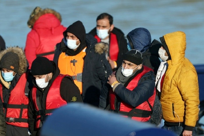 Migrants arrive into the Port of Dover onboard a Border Force vessel after being rescued while crossing the English Channel, in Dover, Britain, January 14, 2022. (Photo: Reuters)
