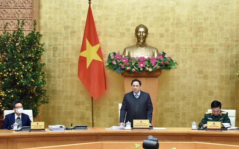Prime Minister Pham Minh Chinh (standing) speaks at the meeting (Photo: NDO/Tran Hai)