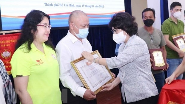 Charity organisations and groups honoured at the event (Photo: VNA)