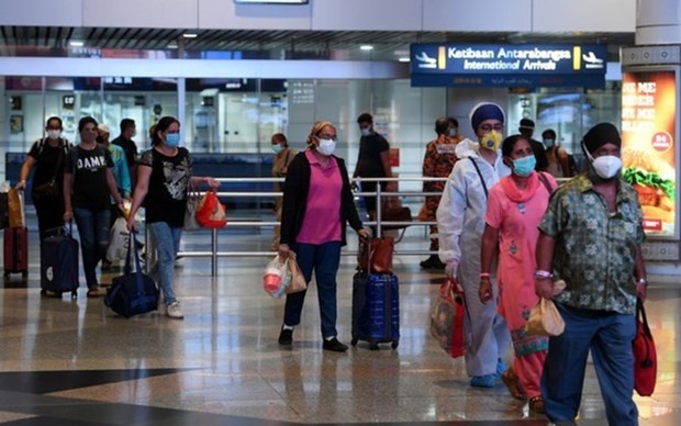 Passengers at an airport in Malaysia (Photo: Bernama)
