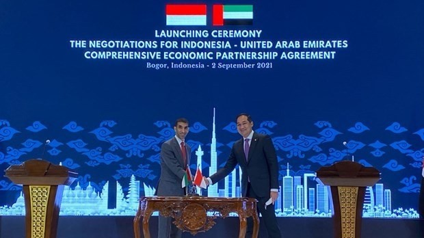 Indonesian Trade Minister Muhammad Lutfi (R) and UAE Minister of State for Foreign Trade Thani bin Ahmed Al Zeyoudi. (Source: The Jakarta Post/Norman Harsono)