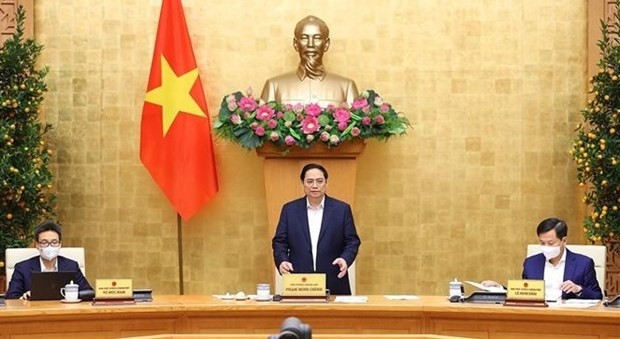 Prime Minister Pham Minh Chinh speaks at the meeting (Photo: VNA)