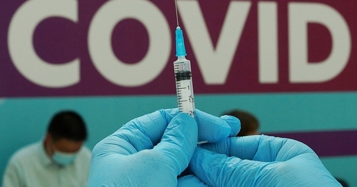 Russia reported a record daily number of COVID-19 cases on Sunday as the Omicron variant of coronavirus has spread, authorities said.