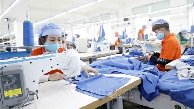 To fulfill the economic growth target of 6.5-7 percent for 2021-2025, the programme is set to ensure rapid recovery and development, as well as safe adaptation to the COVID-19 pandemic in 2022-2023. (Photo: VNA)