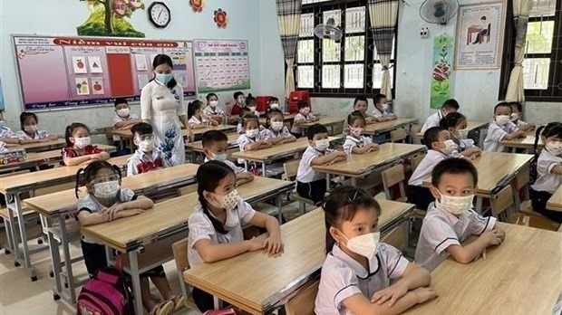 Kindergartens and primary schools in Ho Chi Minh City resume in-person classes on February 14. (Photo: VNA)