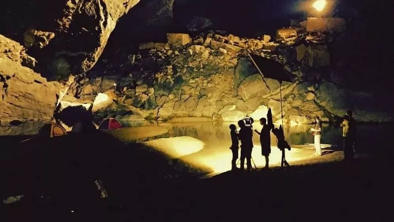 The film crew inside the cave