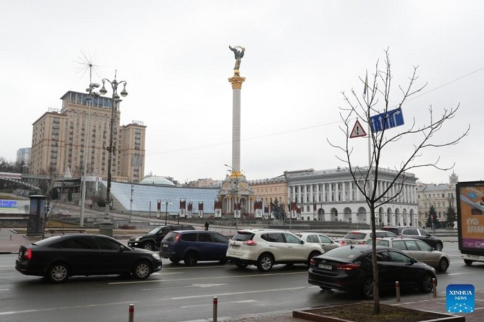 Vehicles travel past the Independence Square in Kiev, Ukraine, Feb. 24, 2022. (Photo: Xinhua)