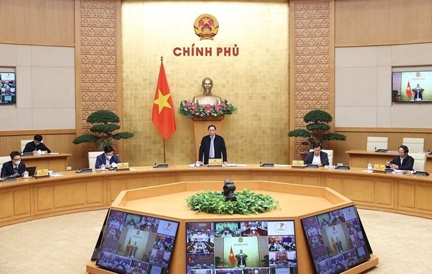 Prime Minister Pham Minh Chinh speaking at the meeting. (Photo: VNA)